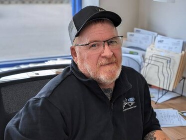 Staff member Ken Larson from ID_219df0