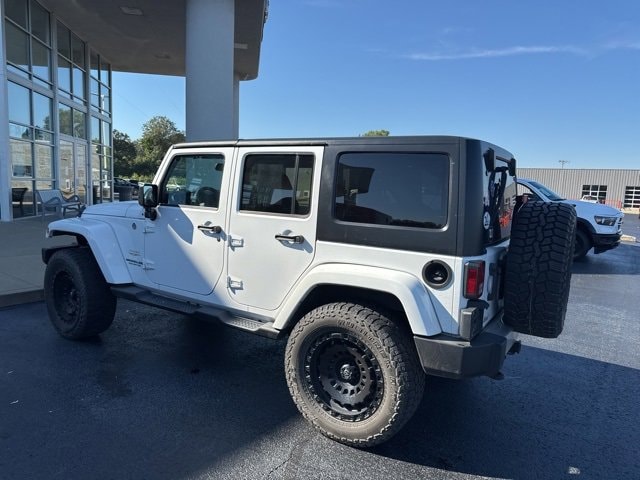 Used 2013 Jeep Wrangler Unlimited Sahara with VIN 1C4BJWEG8DL667319 for sale in Metropolis, IL