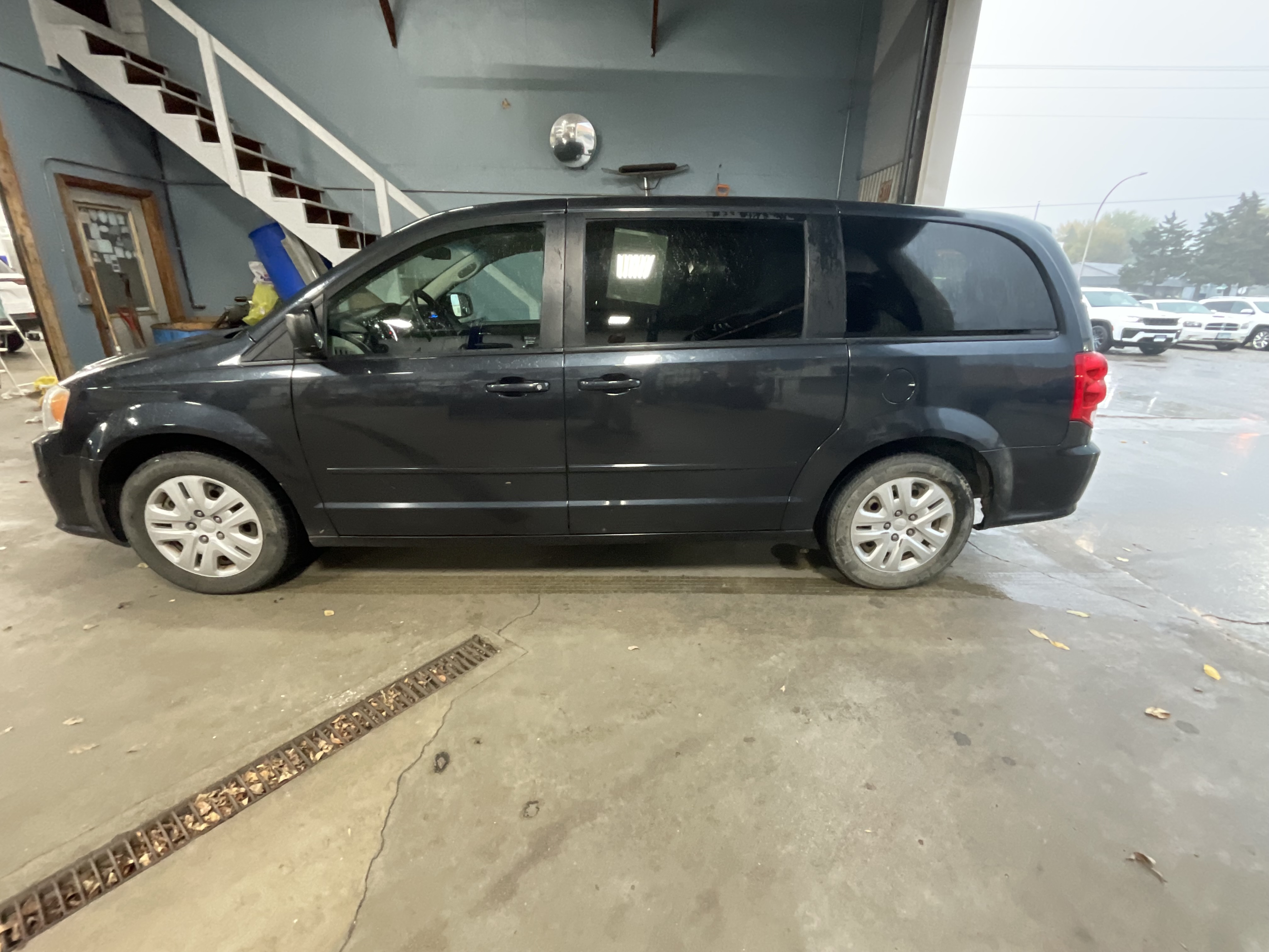 Used 2014 Dodge Grand Caravan SE with VIN 2C4RDGBG9ER393007 for sale in Litchfield, Minnesota
