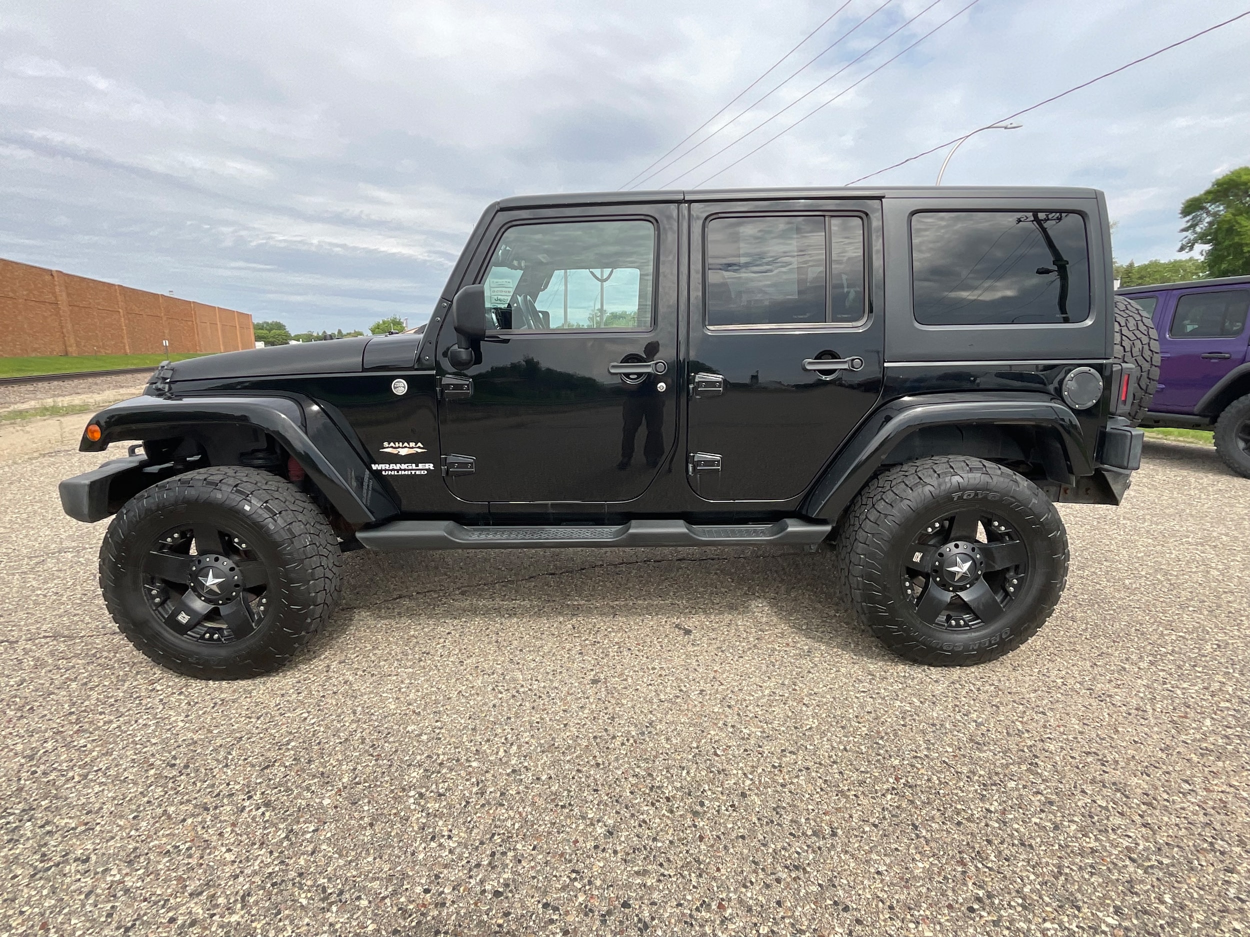 Used 2013 Jeep Wrangler Unlimited Sahara with VIN 1C4BJWEG1DL541822 for sale in Litchfield, Minnesota