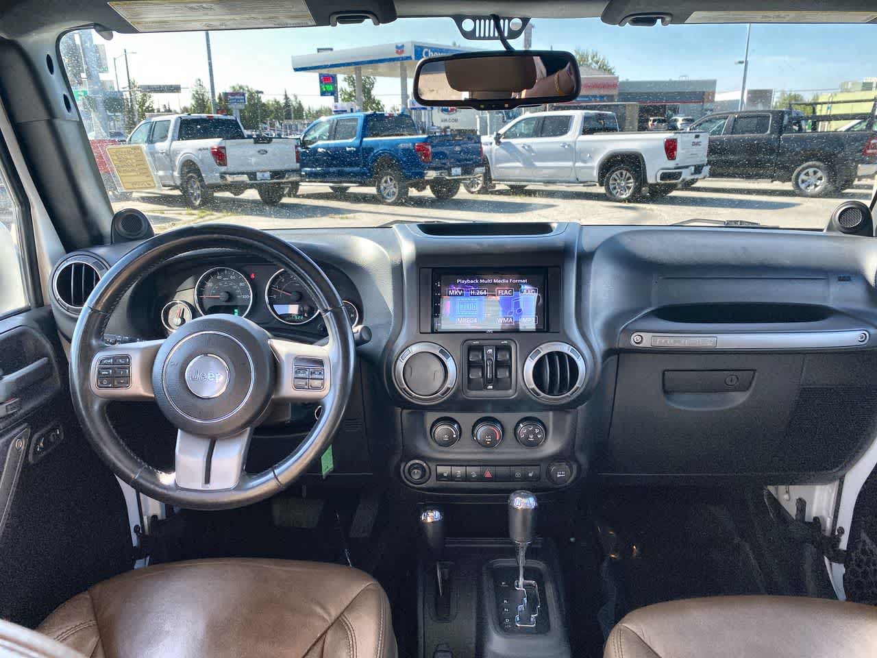 Used 2013 Jeep Wrangler Unlimited Sahara with VIN 1C4BJWEG9DL564734 for sale in Anchorage, AK