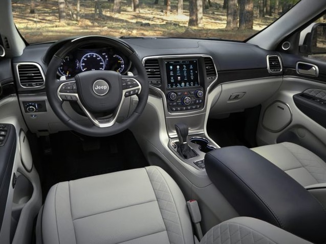 grey Jeep Grand Cherokee SUV interior panel and dashboard indicators