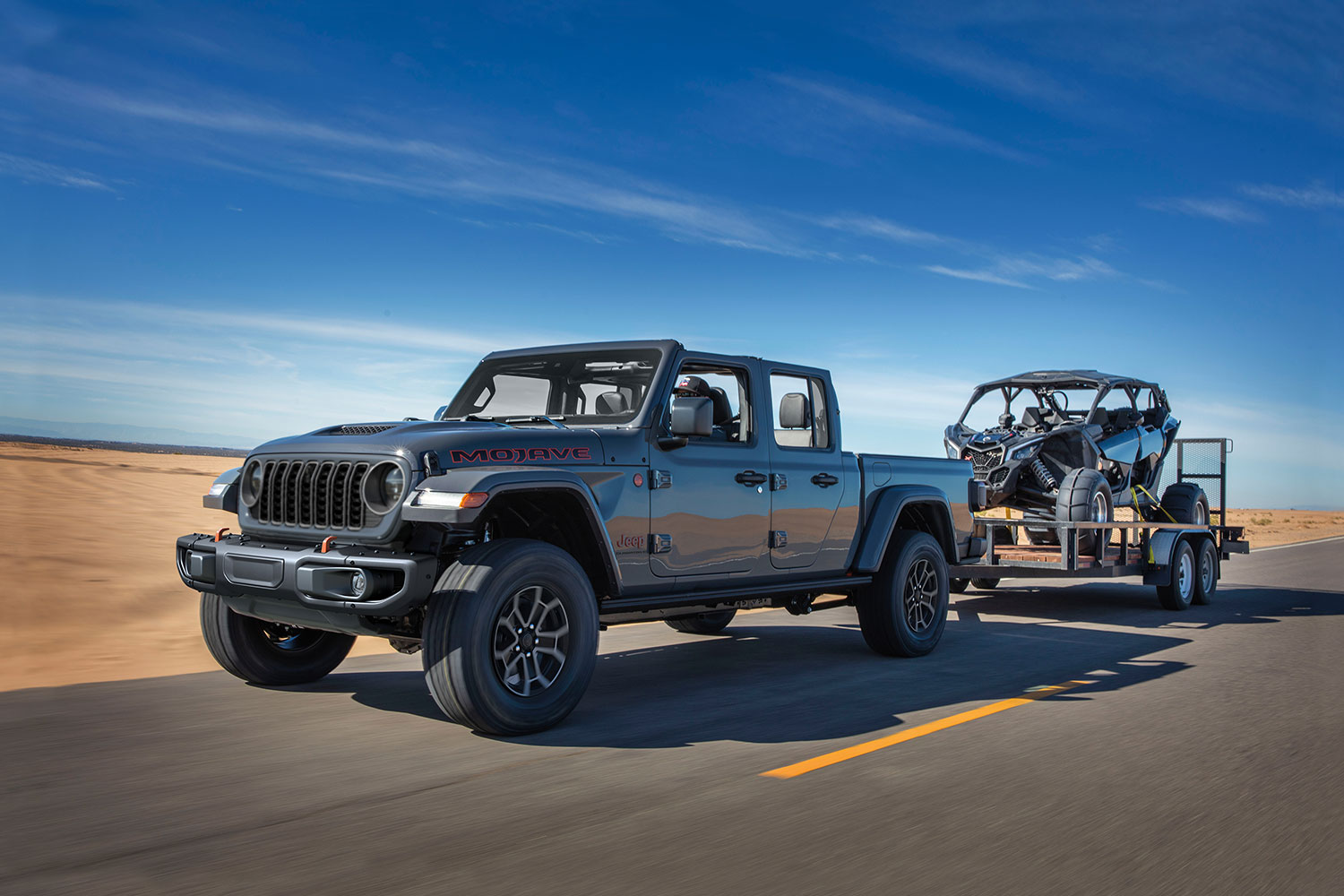 2024 Jeep Gladiator Mojave grey Jeep Gladiator towing an ATV