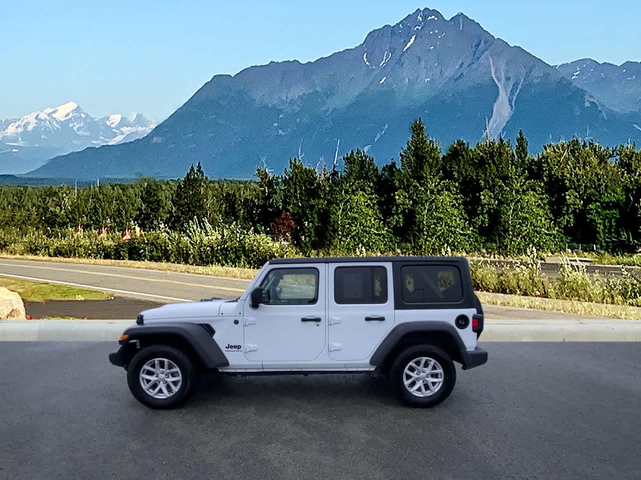 Used 2023 Jeep Wrangler 4-Door Sport S with VIN 1C4HJXDN4PW701890 for sale in Wasilla, AK