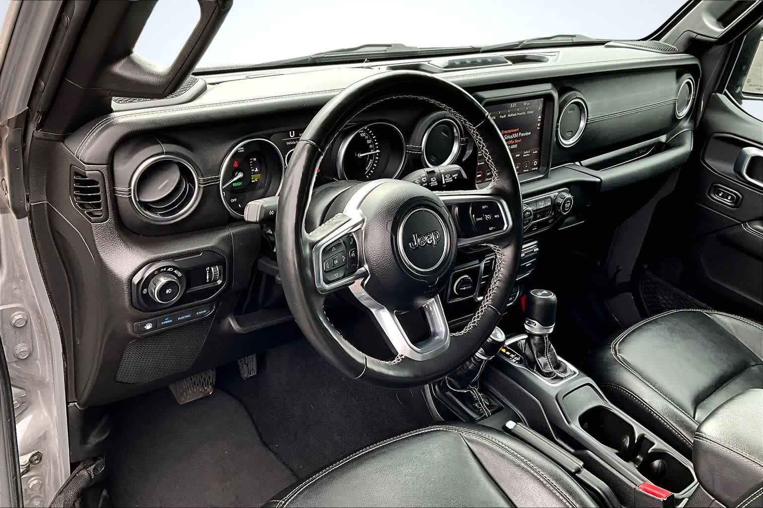 Used 2023 Jeep Wrangler 4xe Sahara 4XE with VIN 1C4JJXP66PW580589 for sale in Spokane, WA