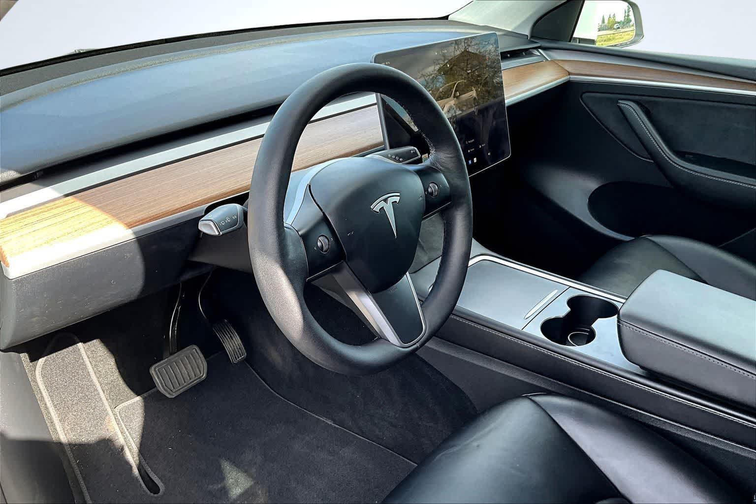 Used 2023 Tesla Model Y Long Range with VIN 7SAYGDEE6PF687834 for sale in Spokane, WA