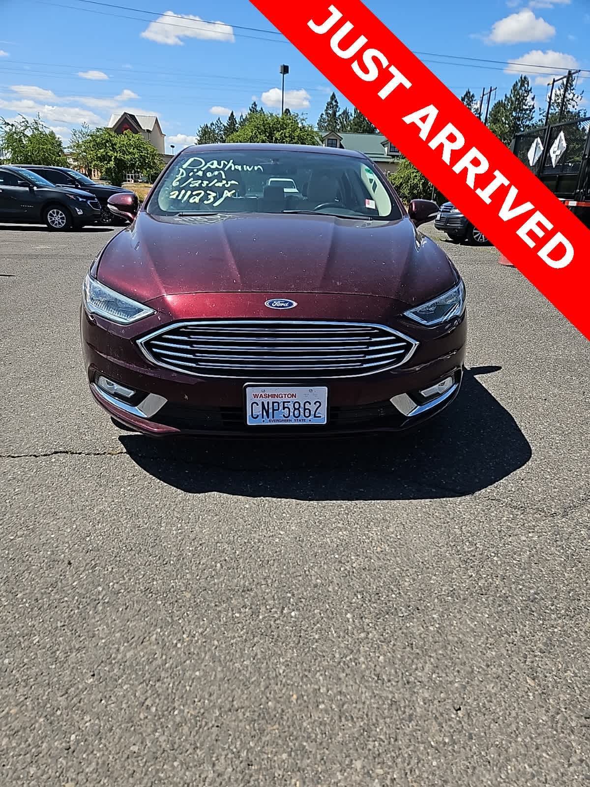 Used 2017 Ford Fusion Energi Titanium with VIN 3FA6P0SU2HR211238 for sale in Spokane, WA