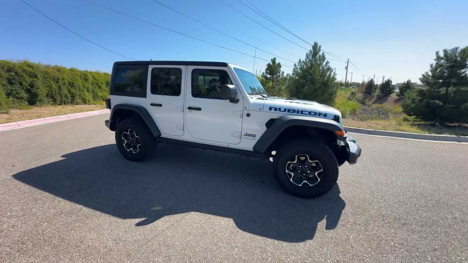 Used 2023 Jeep Wrangler 4xe Rubicon 4XE with VIN 1C4JJXR6XPW604602 for sale in Santa Fe, NM