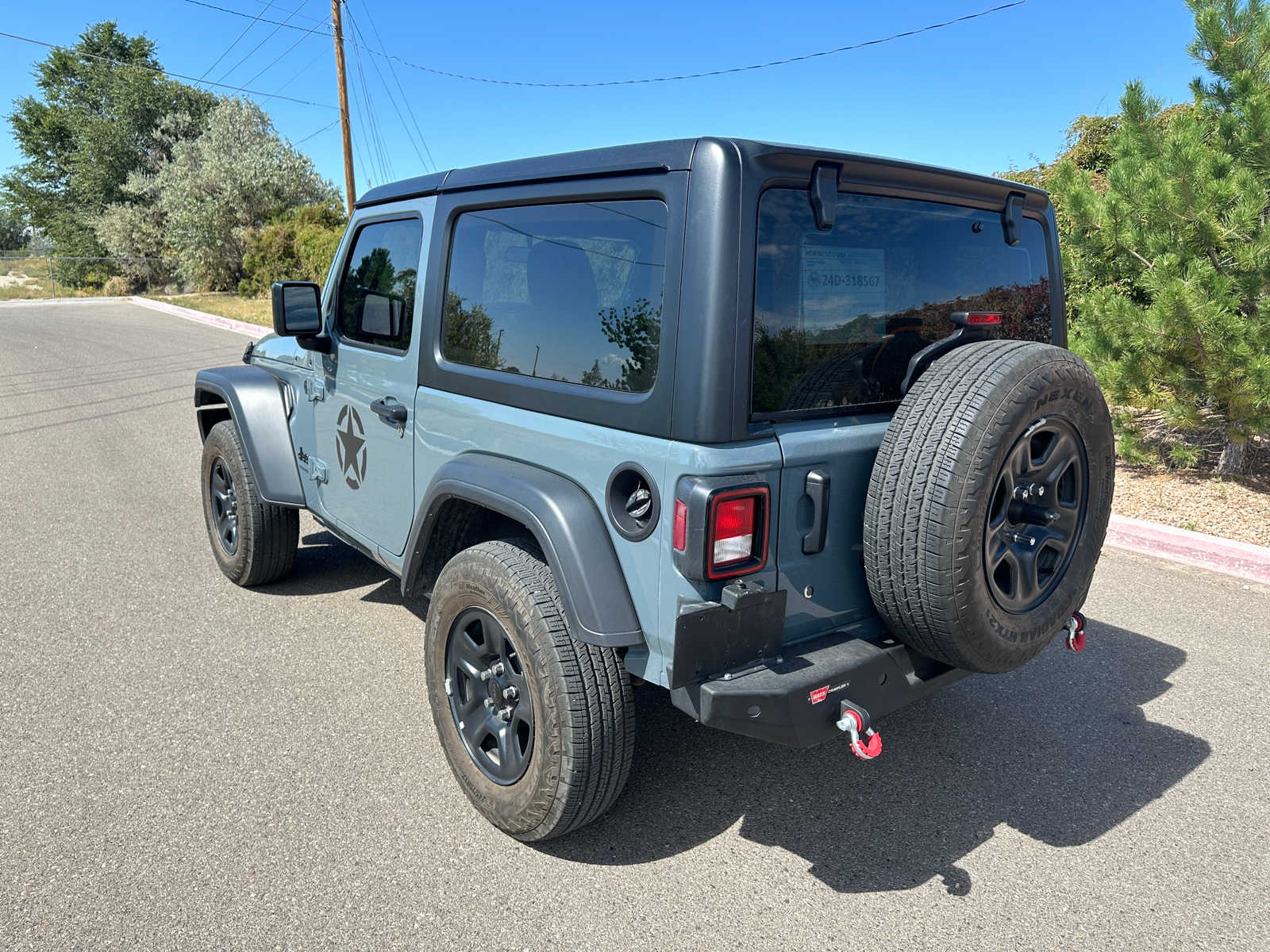 Used 2024 Jeep Wrangler 2-Door Sport with VIN 1C4PJXAN1RW153575 for sale in Santa Fe, NM