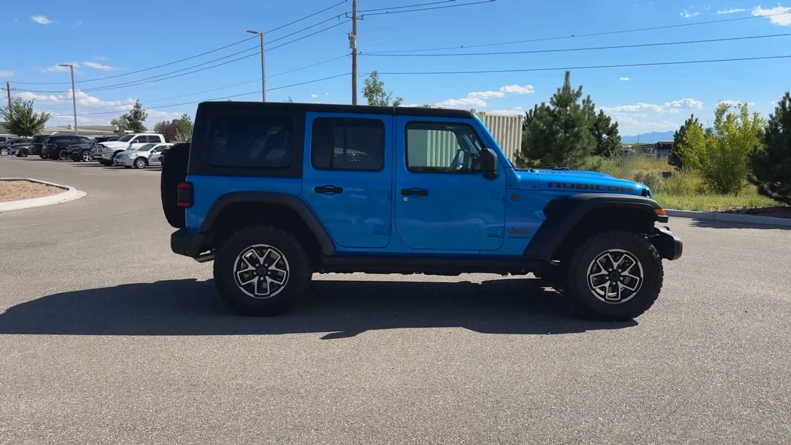 Used 2024 Jeep Wrangler 4-Door Rubicon with VIN 1C4PJXFG9RW138719 for sale in Santa Fe, NM