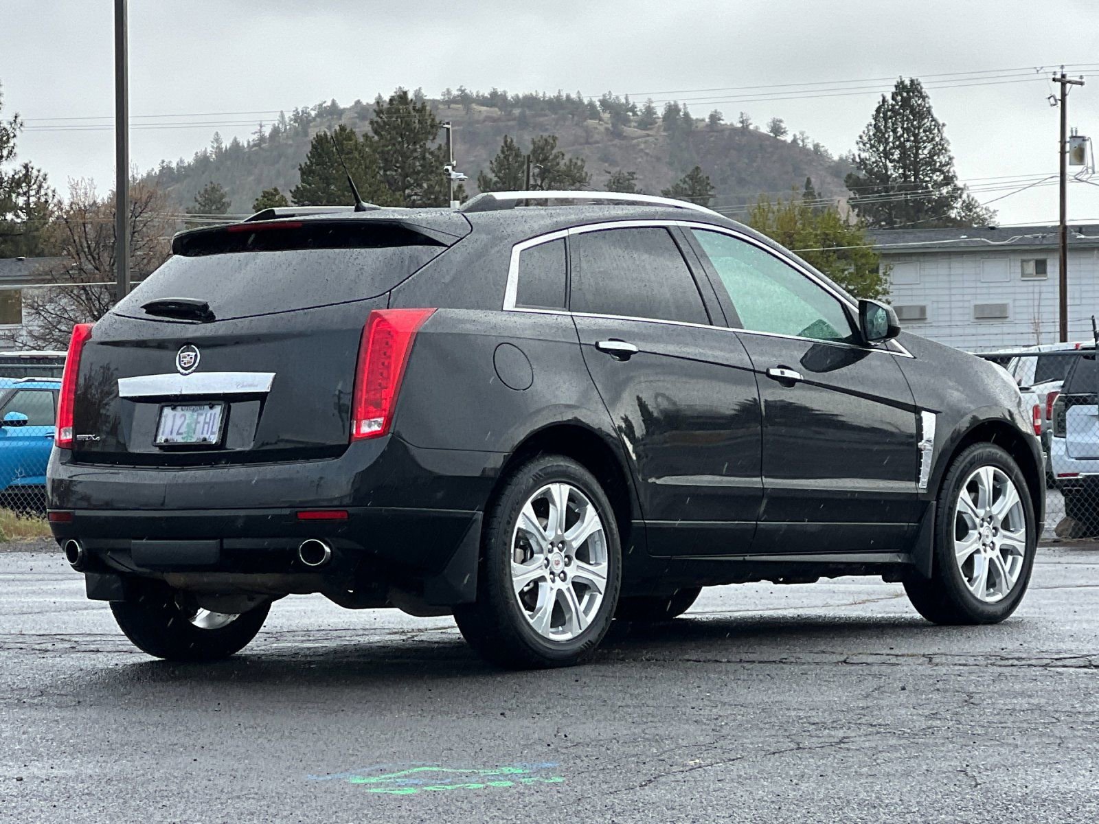 Used 2011 Cadillac SRX Premium Collection with VIN 3GYFNFEY1BS674418 for sale in Bend, OR