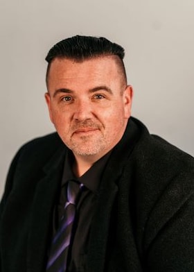 Staff member Mark Schmid from ID_abb257cb2299