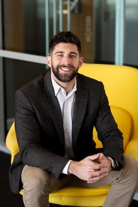 Staff member Dylan Carson from ID_659983768402