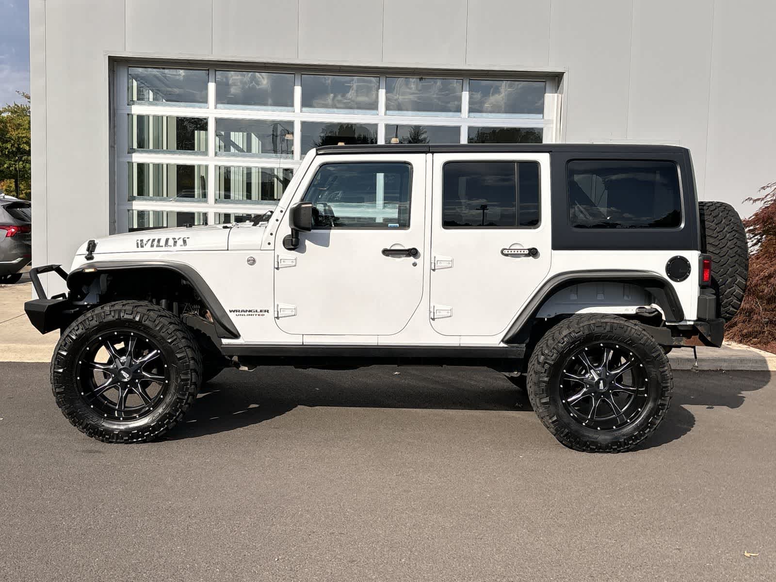 Used 2014 Jeep Wrangler Unlimited Sport with VIN 1C4BJWDG0EL255642 for sale in Eugene, OR