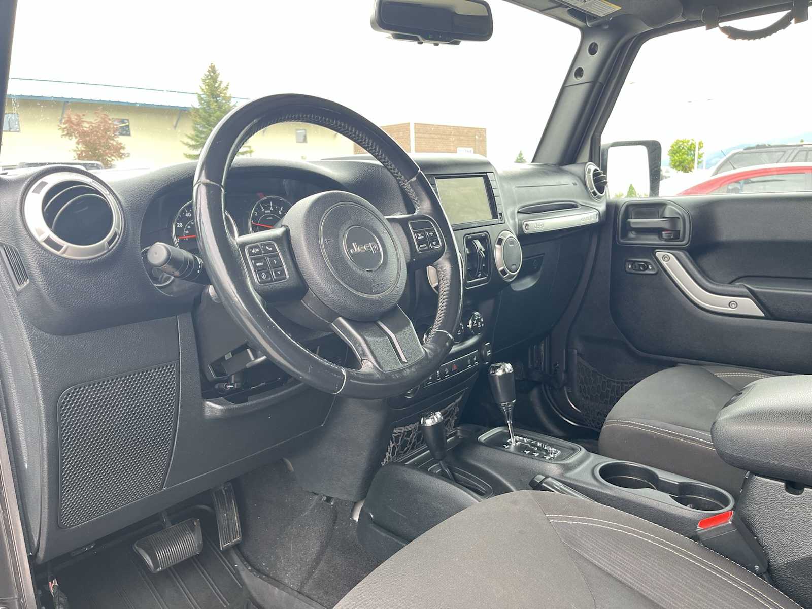 Used 2016 Jeep Wrangler Unlimited Sahara with VIN 1C4BJWEG8GL248584 for sale in Missoula, MT
