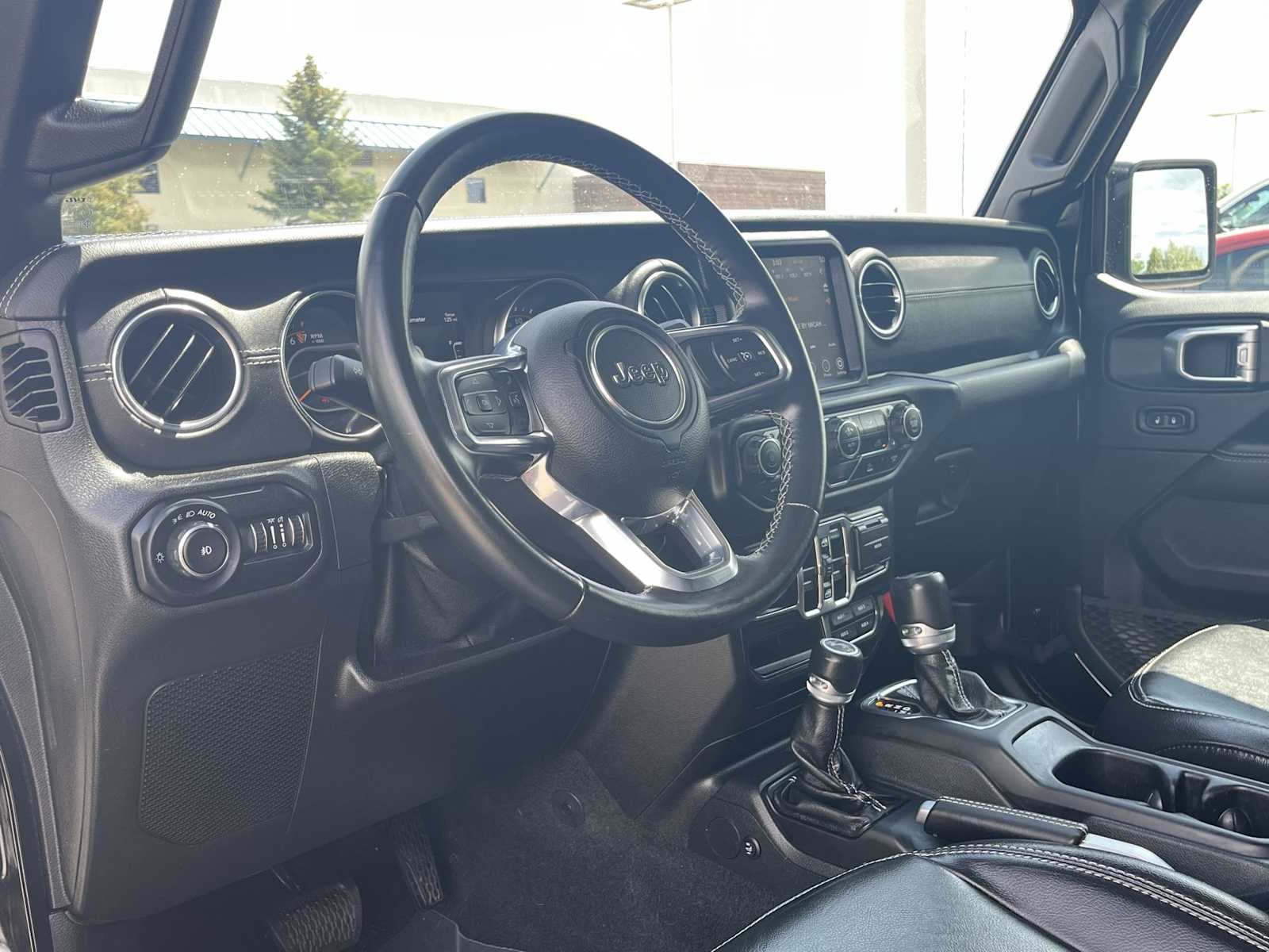 Used 2021 Jeep Wrangler Unlimited Sahara with VIN 1C4HJXEG3MW823507 for sale in Missoula, MT