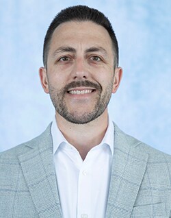 Staff member AJ LeCoure from 544b65757010