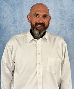 Staff member Joseph Daugherty from 544b65757010