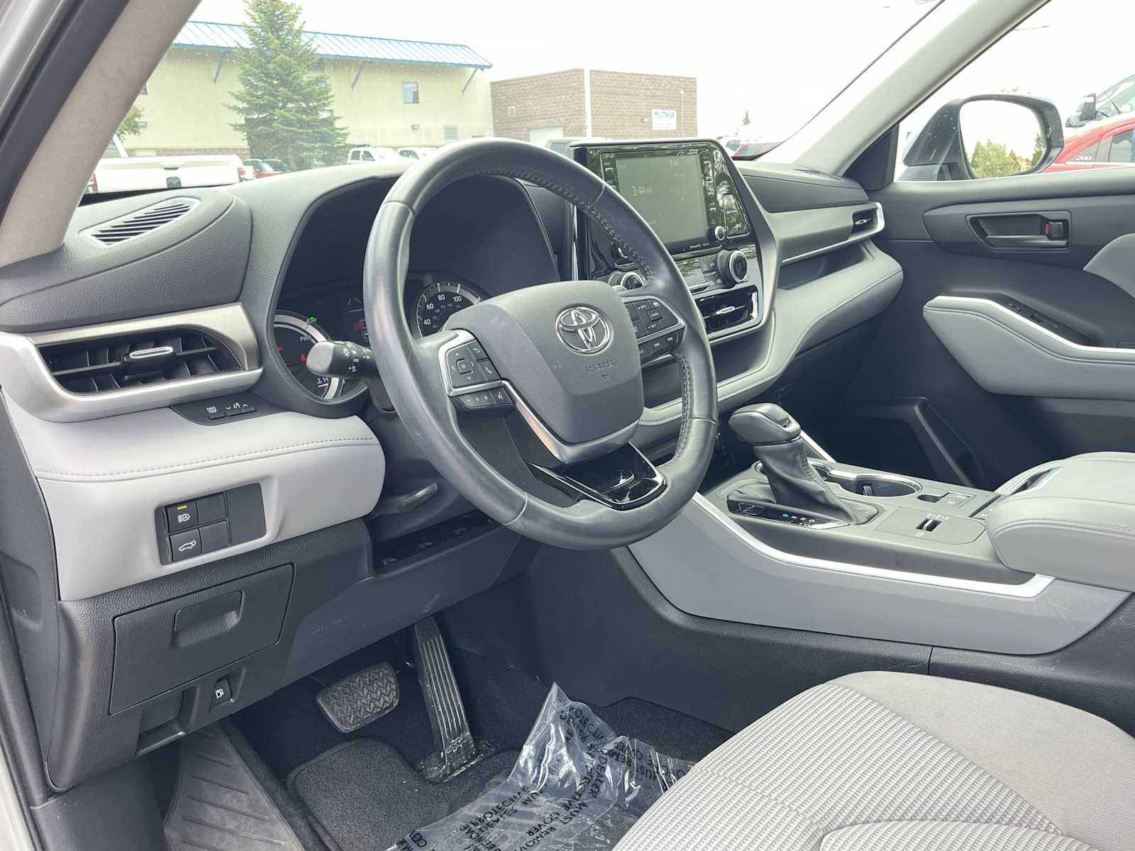 Used 2021 Toyota Highlander LE with VIN 5TDBBRCHXMS533579 for sale in Missoula, MT