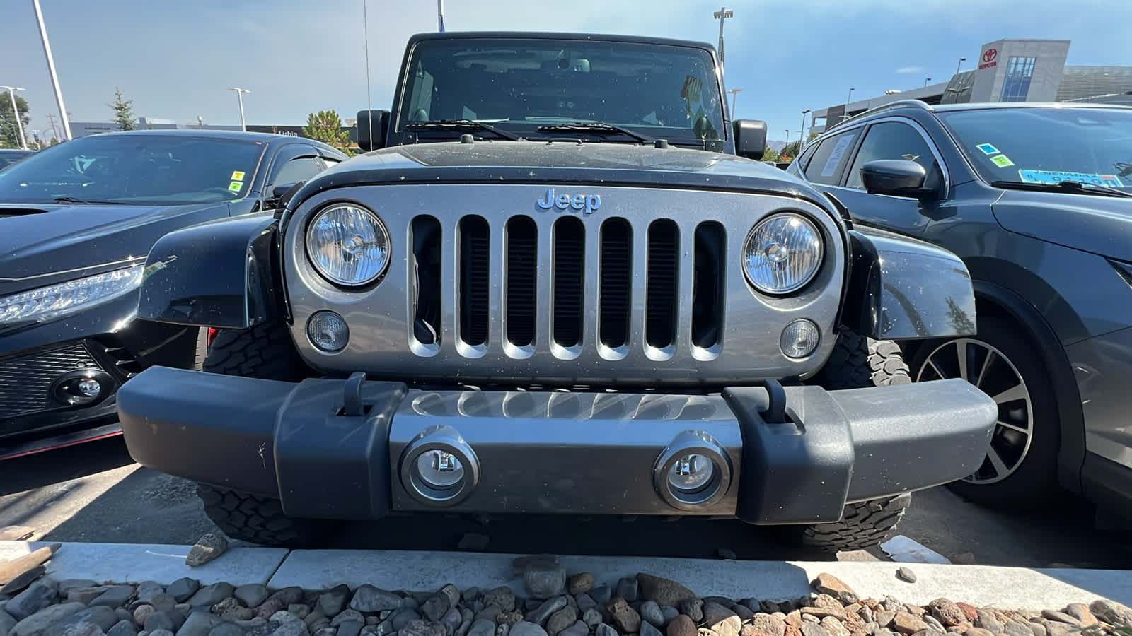 Used 2014 Jeep Wrangler Unlimited Freedom Edition with VIN 1C4BJWDG2EL212601 for sale in Reno, NV