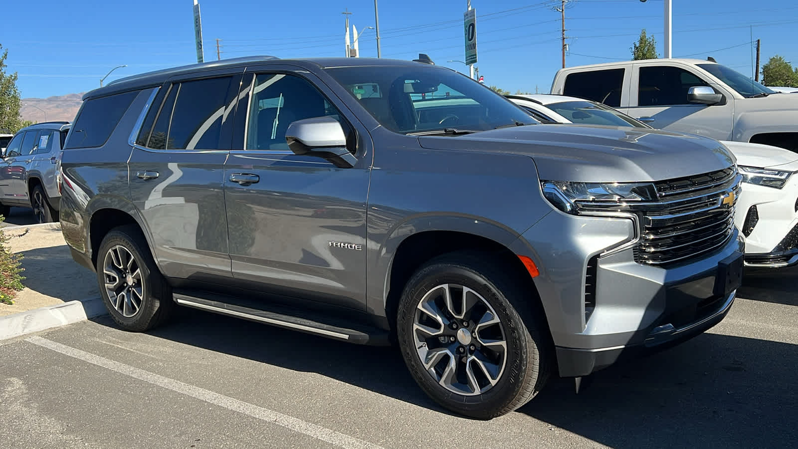 Used 2021 Chevrolet Tahoe LT with VIN 1GNSKNKDXMR410085 for sale in Reno, NV