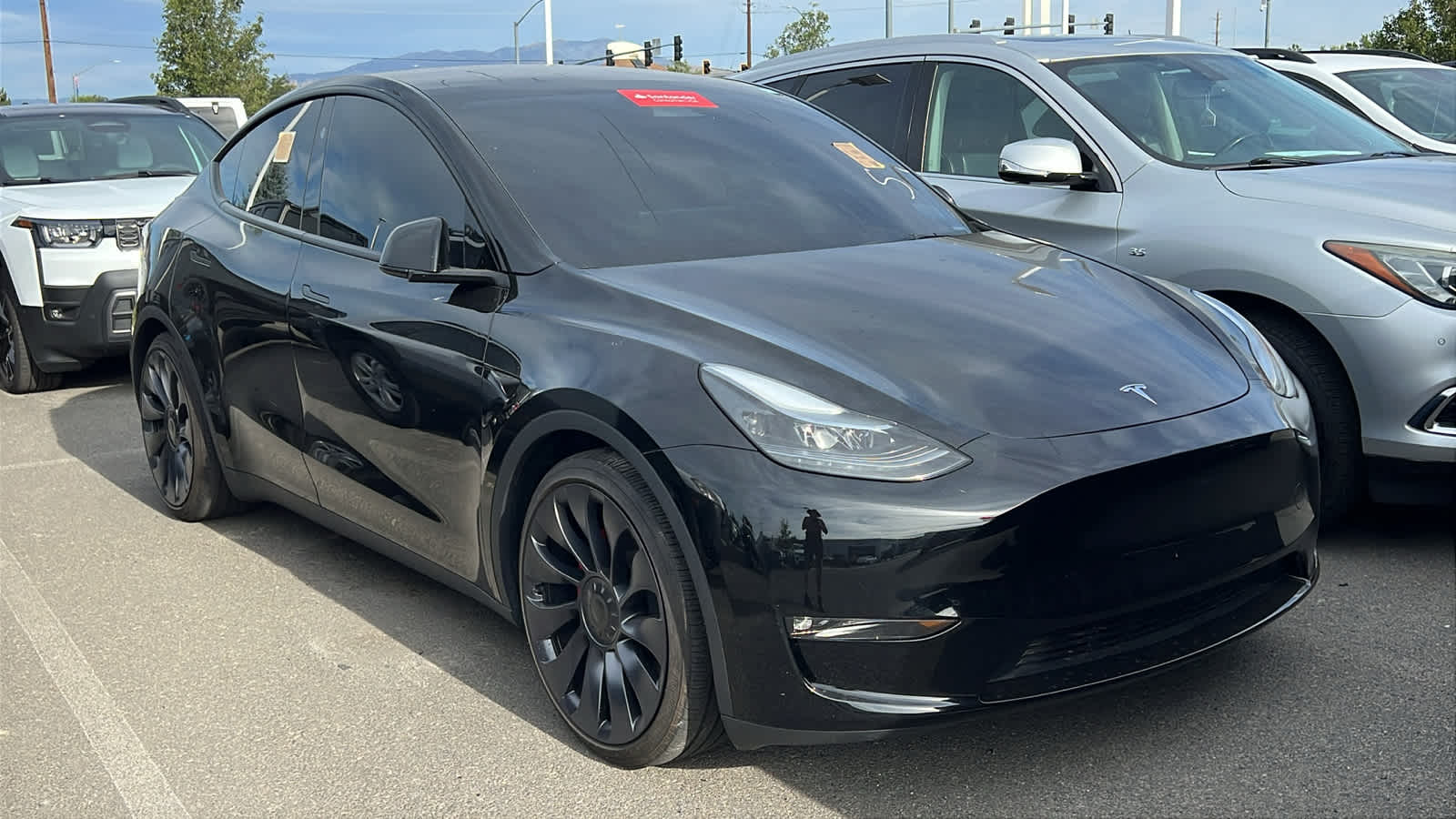 Used 2025 Tesla Model Y Performance with VIN 7SAYGDEF0SF303483 for sale in Reno, NV