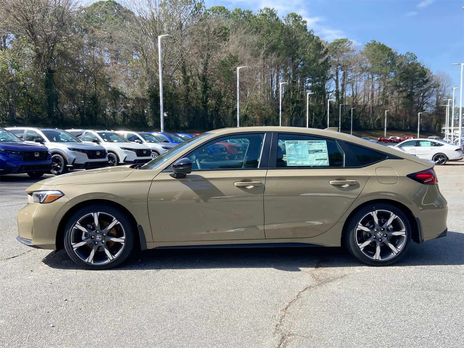 2026 Honda Civic Hybrid Sport Touring Hatchback photo 2