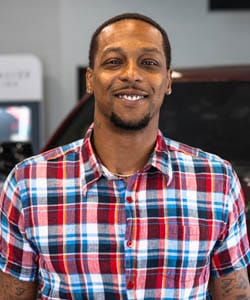 Staff member EJ Ross from 310b5008e248