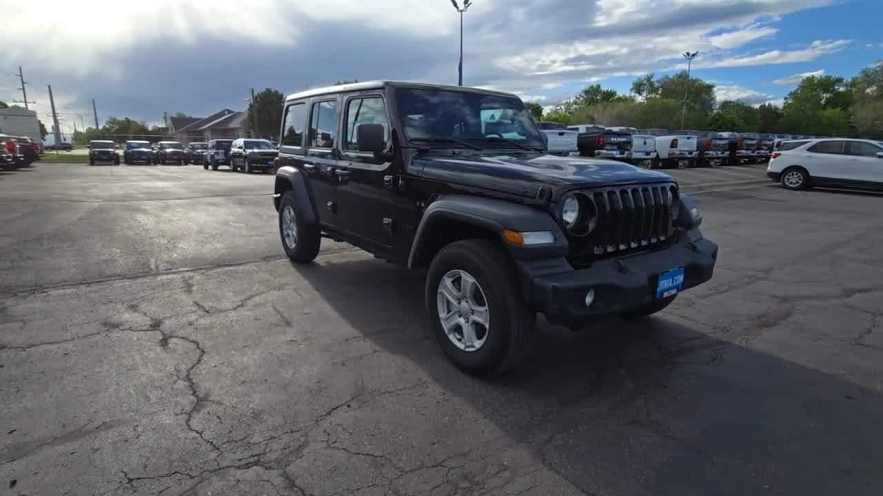 Used 2023 Jeep Wrangler 4-Door Sport S with VIN 1C4HJXDN2PW595861 for sale in Billings, MT