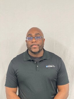 Staff member Alex Parker from ID_43d2f98a6b2e