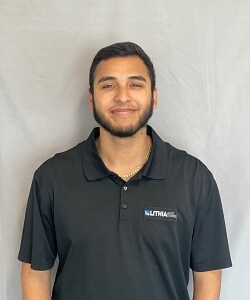 Staff member Christian Castillo from ID_57f147569650