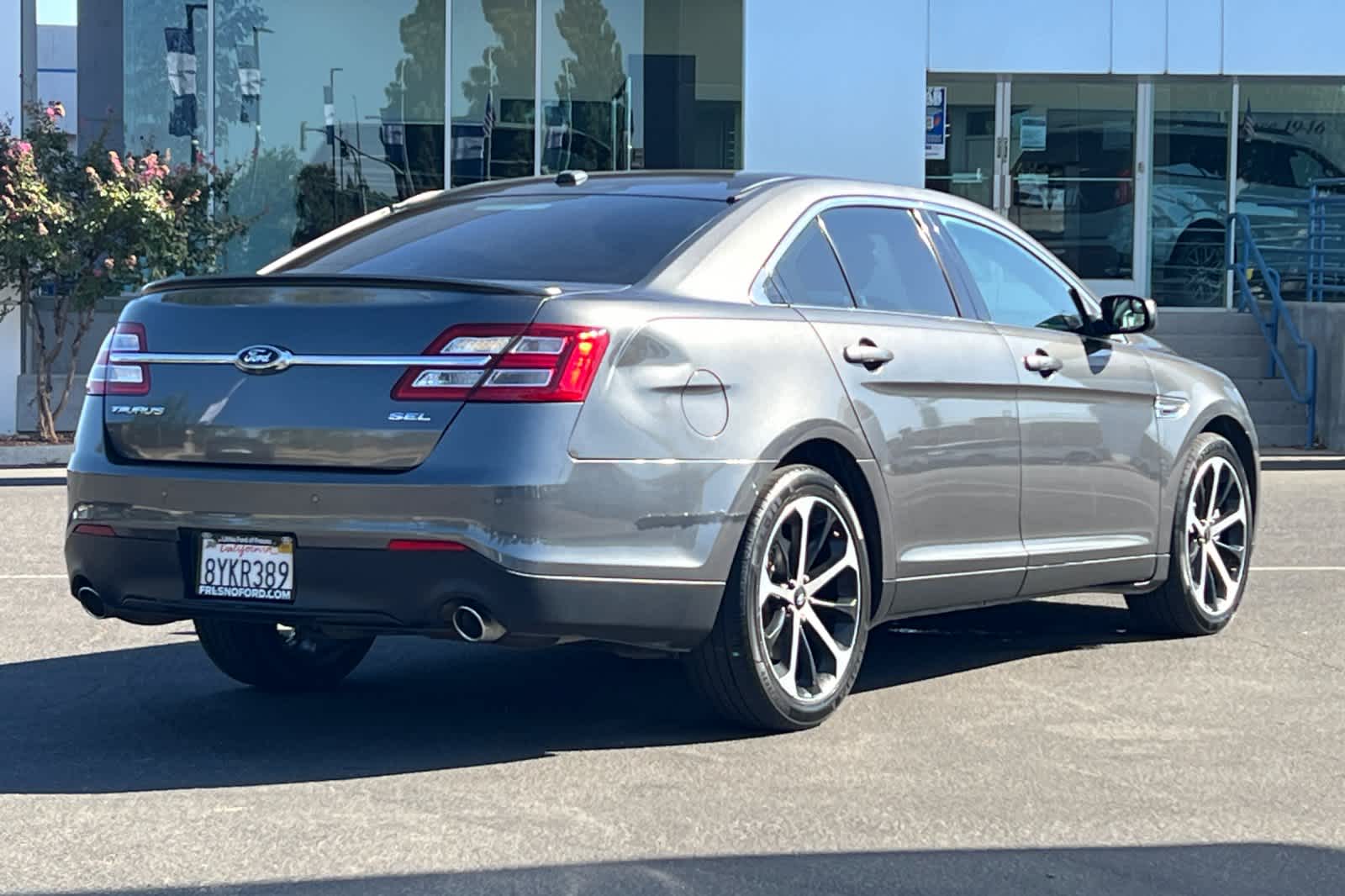 Used 2016 Ford Taurus SEL with VIN 1FAHP2E89GG133582 for sale in Fresno, CA