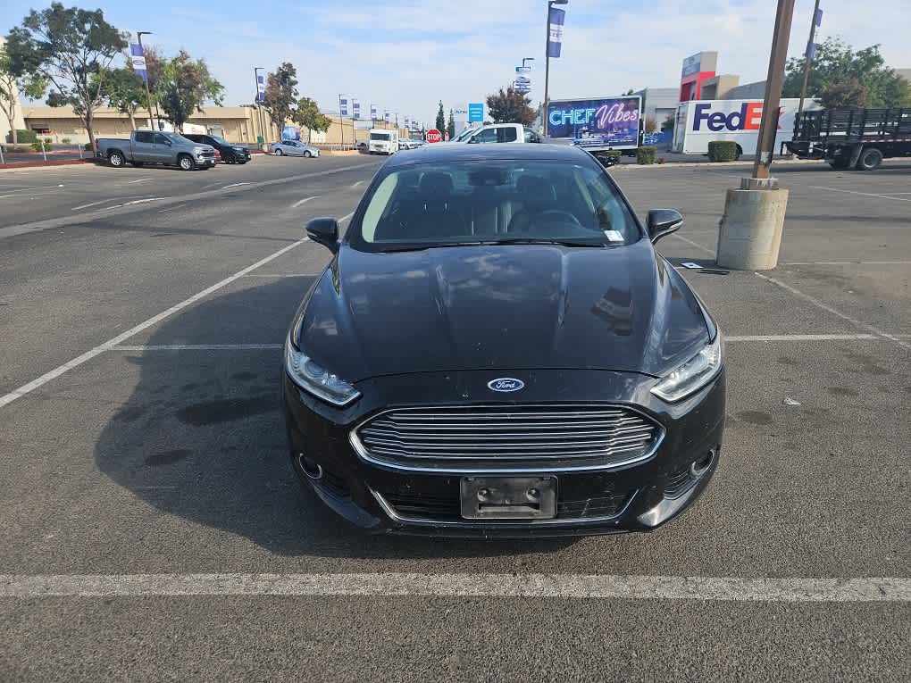 Used 2013 Ford Fusion SE Hybrid with VIN 3FA6P0LU1DR379493 for sale in Fresno, CA