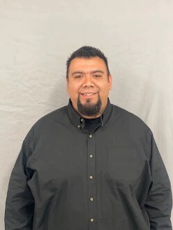 Staff member Tony Contreras from ID_43d2f98a6b2e