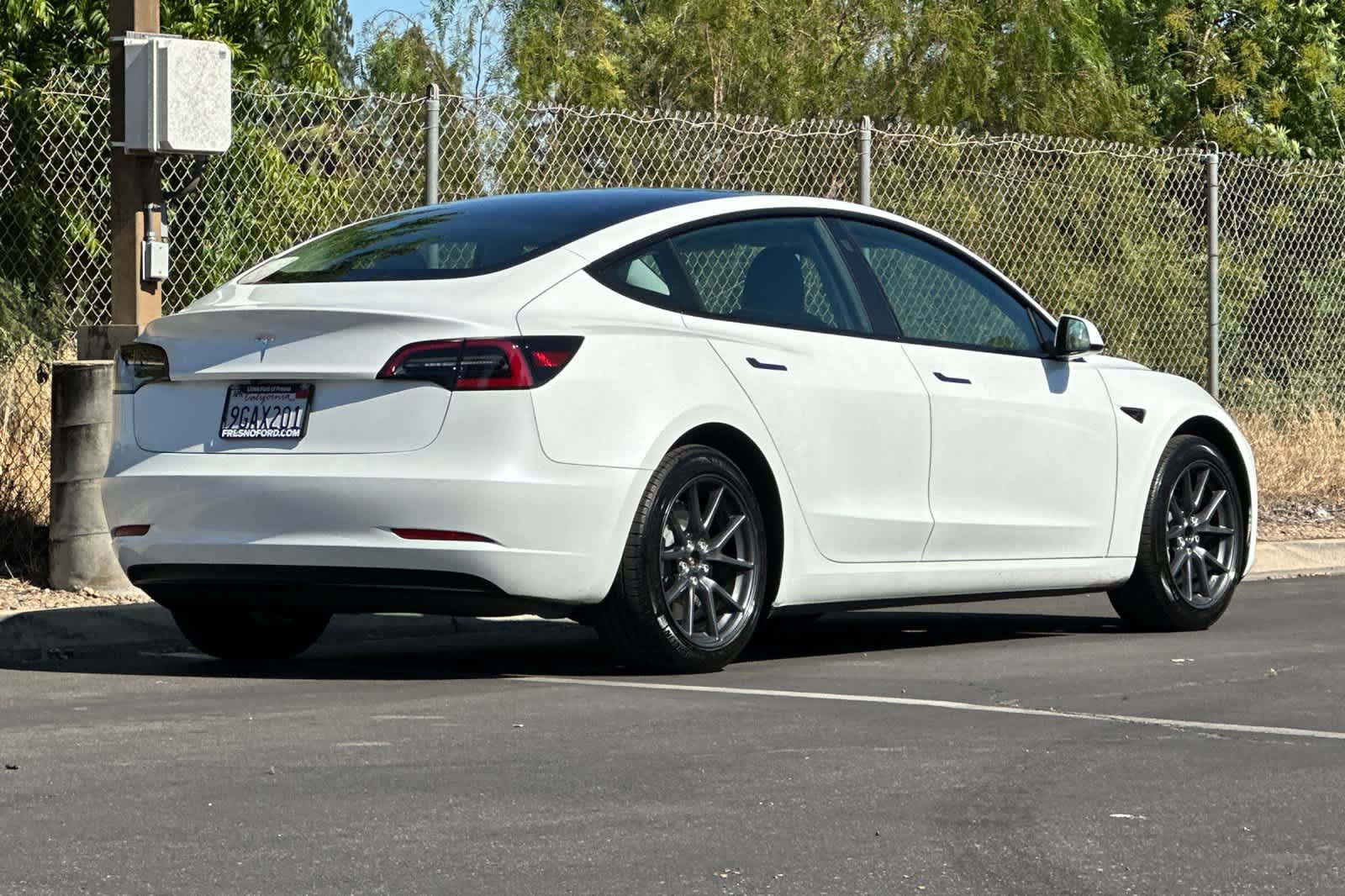 Used 2023 Tesla Model 3 Base with VIN 5YJ3E1EA9PF554932 for sale in Fresno, CA