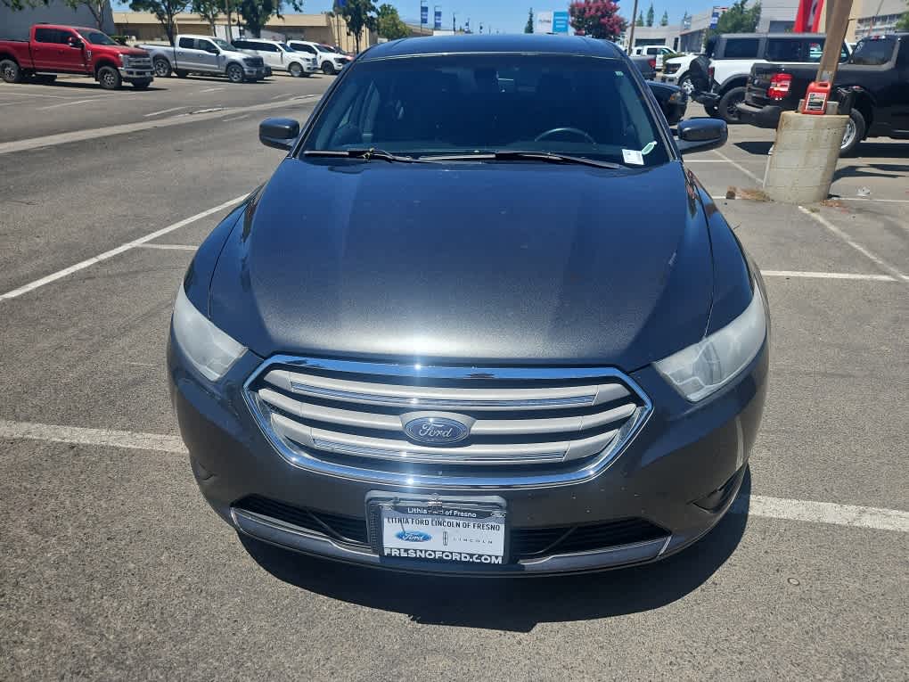 Used 2016 Ford Taurus SEL with VIN 1FAHP2E89GG133582 for sale in Fresno, CA