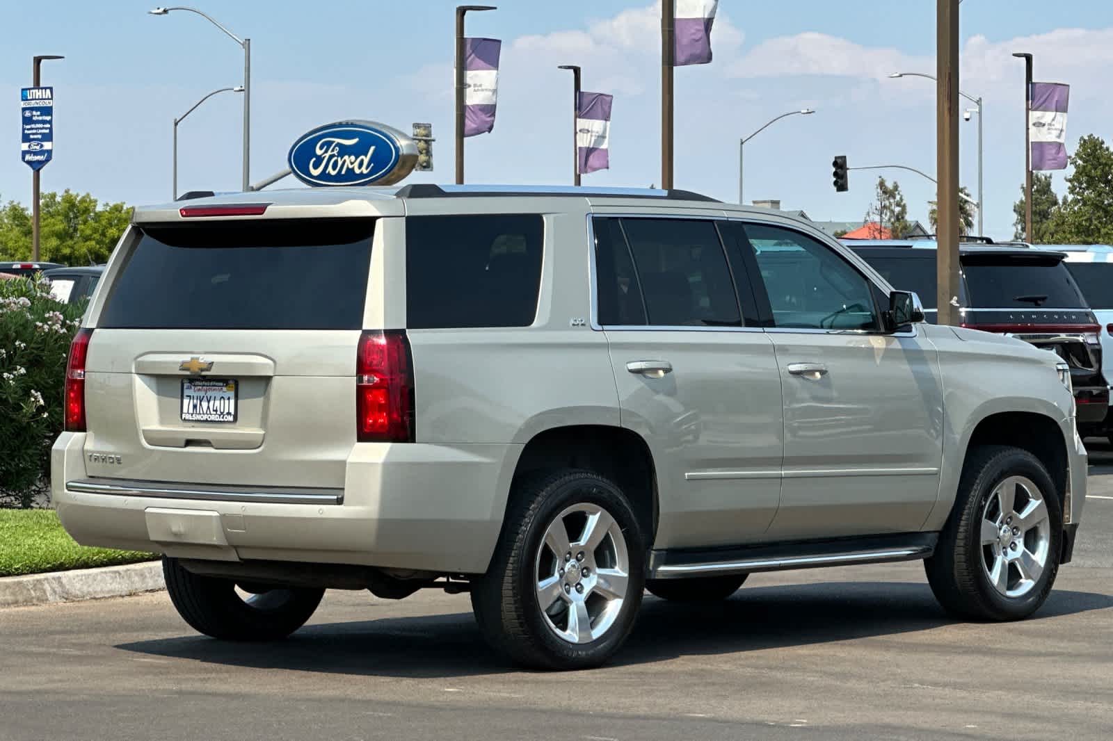 Used 2016 Chevrolet Tahoe LTZ with VIN 1GNSCCKC5GR204637 for sale in Fresno, CA