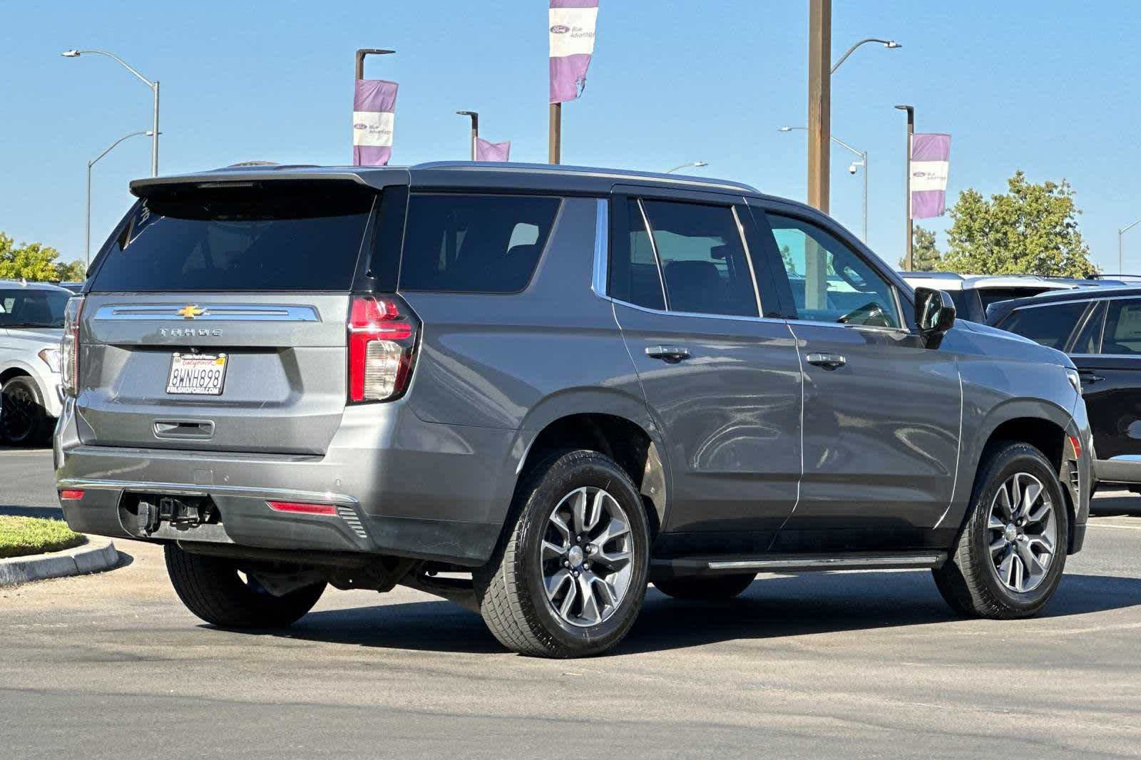 Used 2021 Chevrolet Tahoe LS with VIN 1GNSCMKD5MR334587 for sale in Fresno, CA