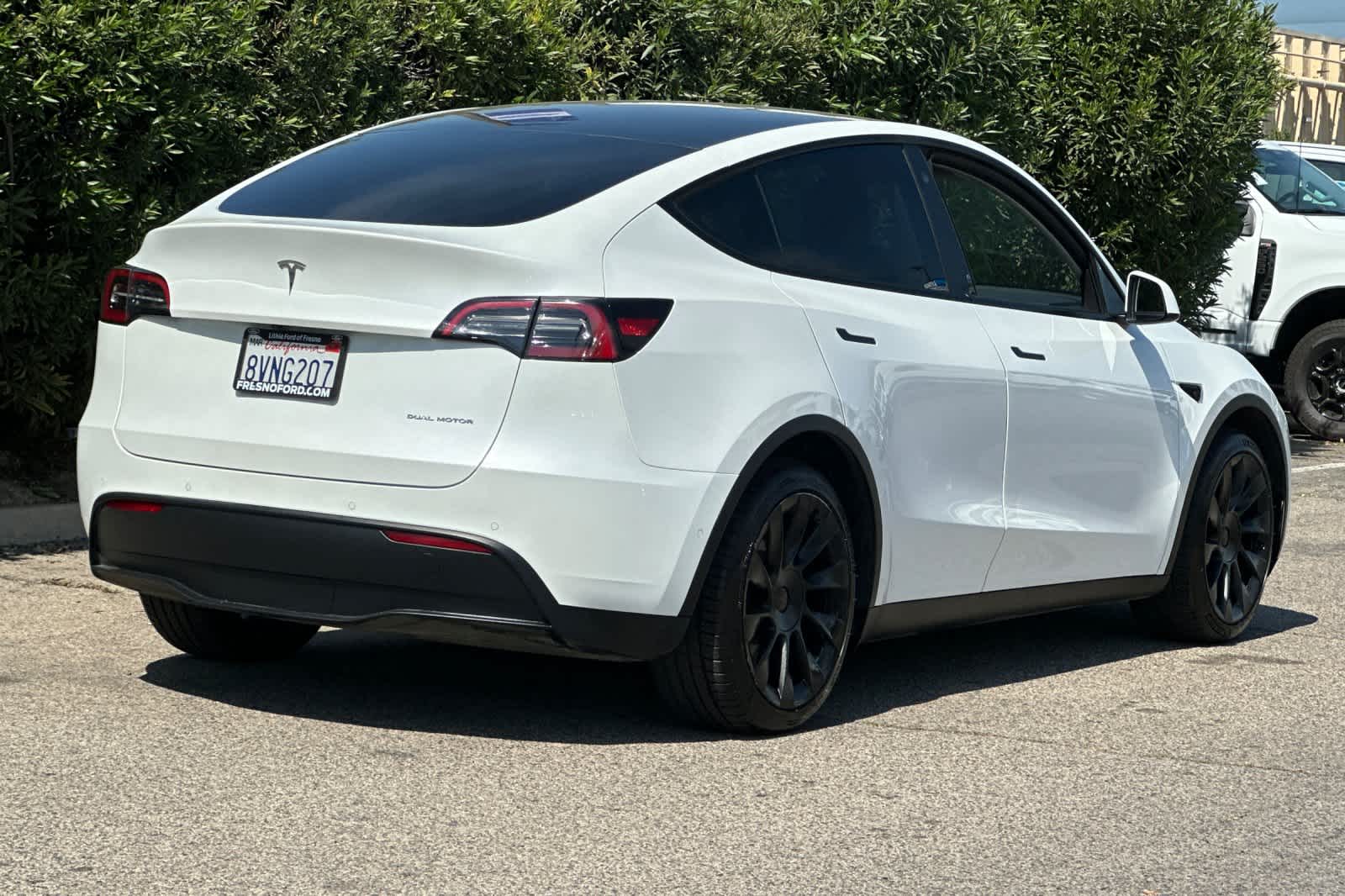Used 2021 Tesla Model Y Long Range with VIN 5YJYGDEE7MF156988 for sale in Fresno, CA