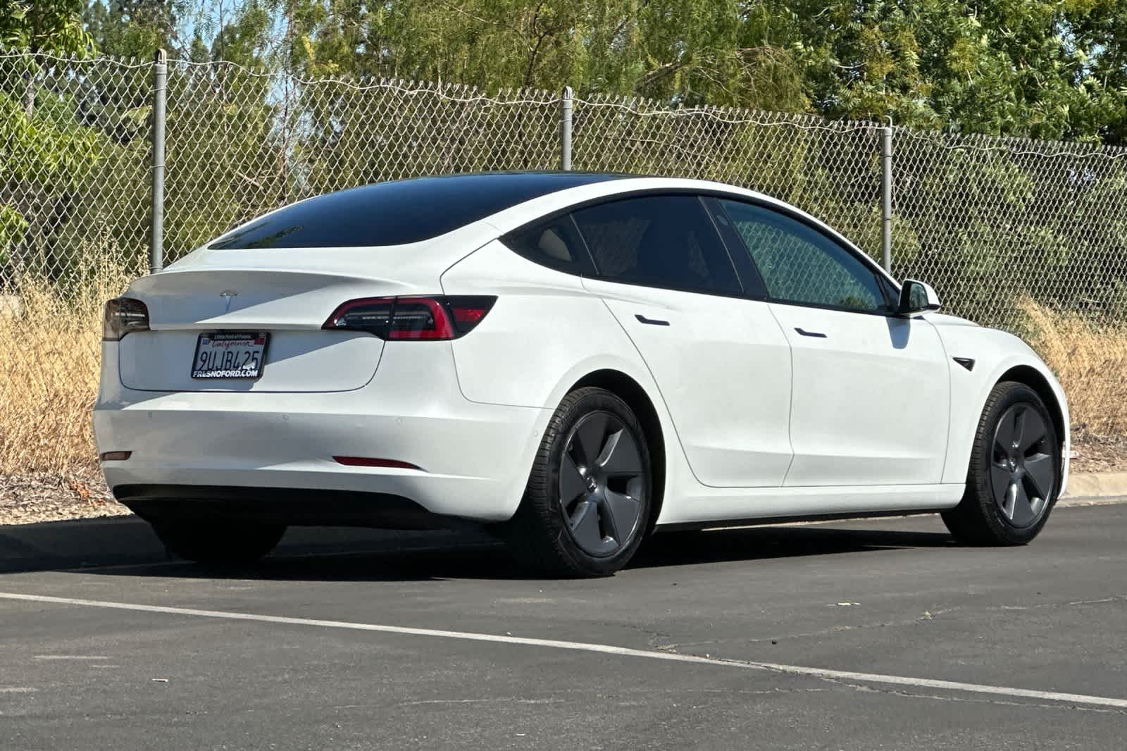 Used 2021 Tesla Model 3 Base with VIN 5YJ3E1EA3MF062036 for sale in Fresno, CA