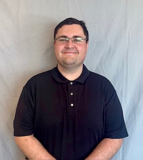Staff member Robert Warrington from ID_6b96a90c9030