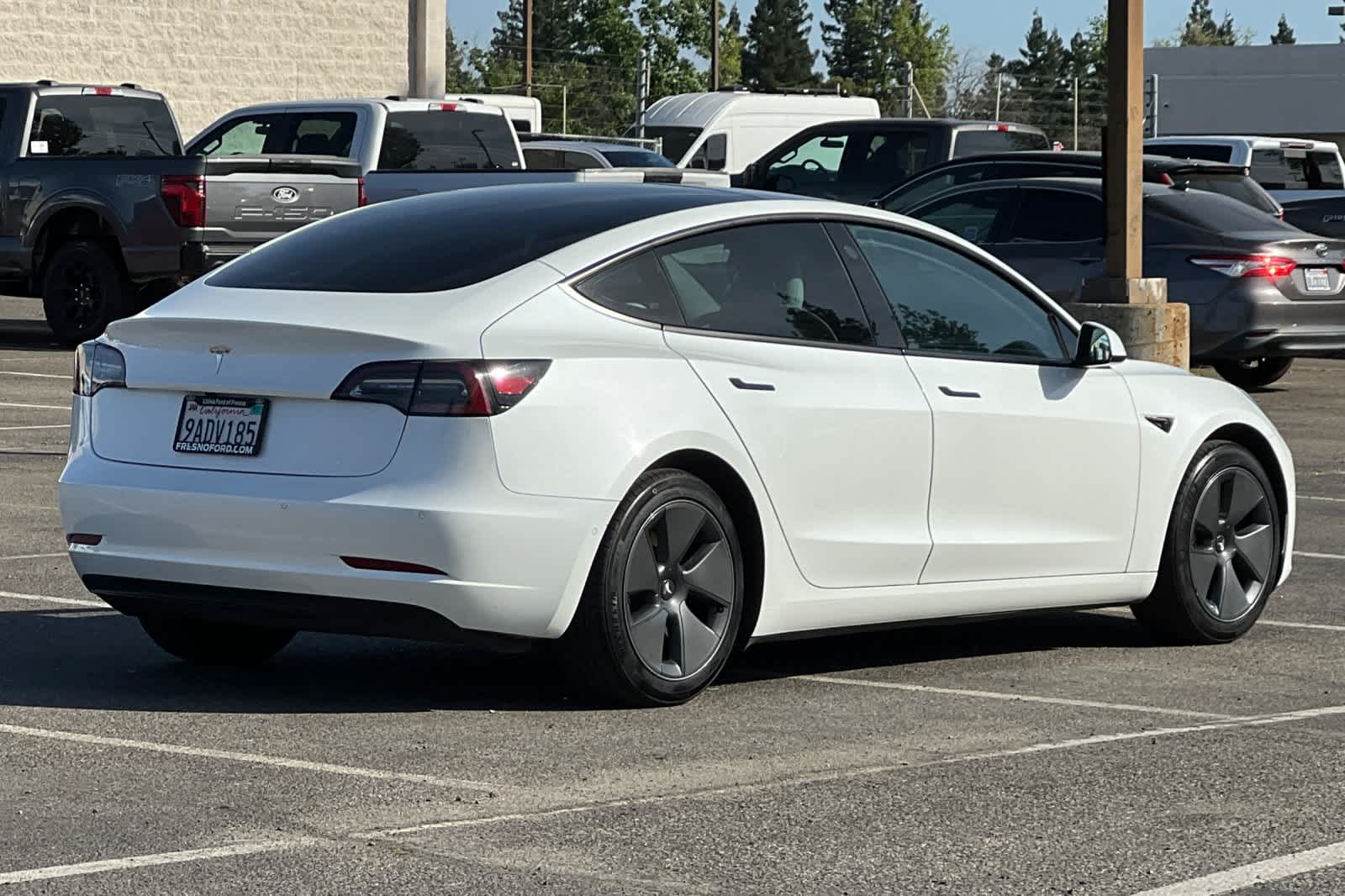 Used 2022 Tesla Model 3 Base with VIN 5YJ3E1EA4NF148649 for sale in Fresno, CA
