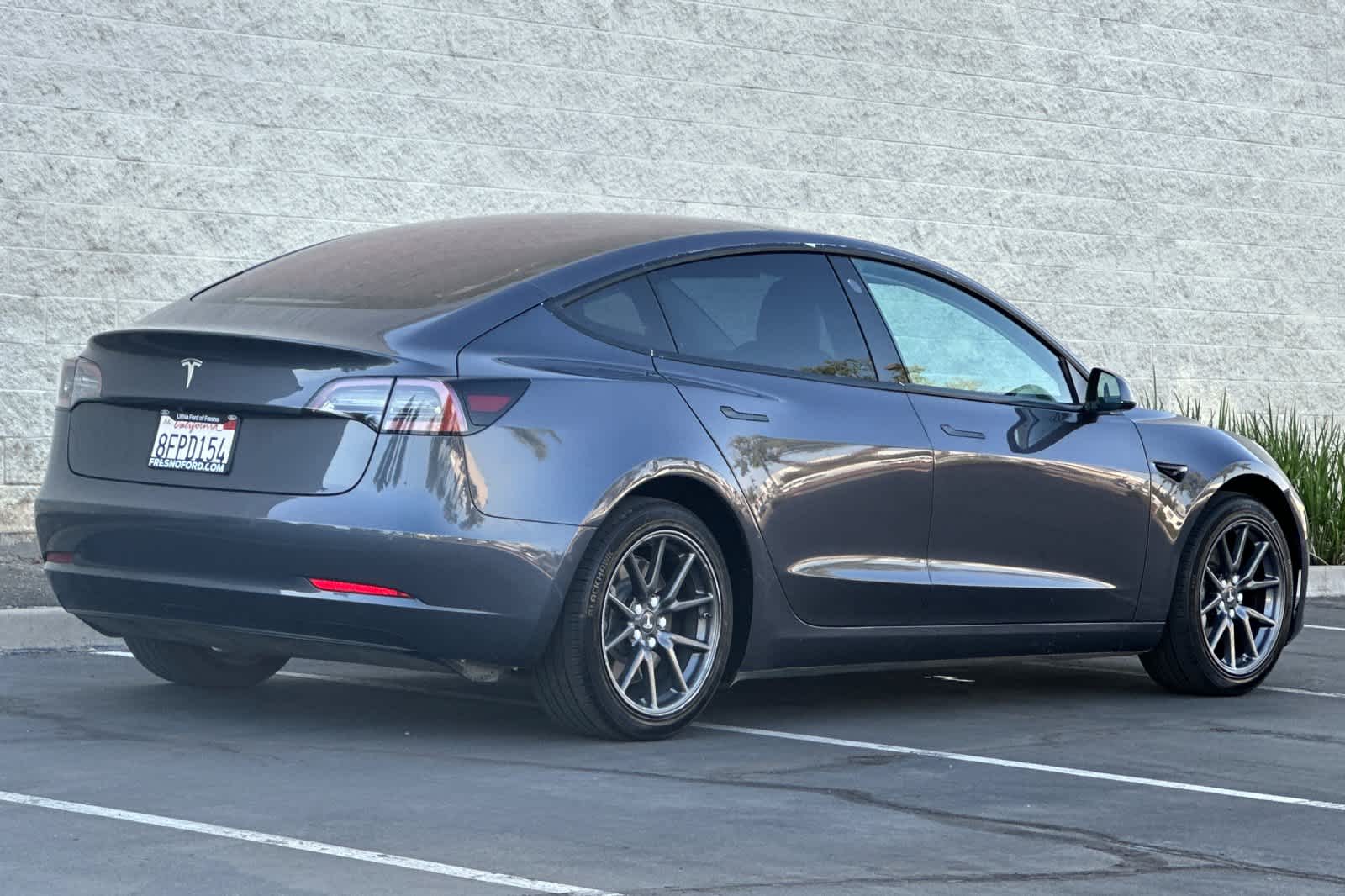 Used 2018 Tesla Model 3 Long Range with VIN 5YJ3E1EA7JF037197 for sale in Fresno, CA