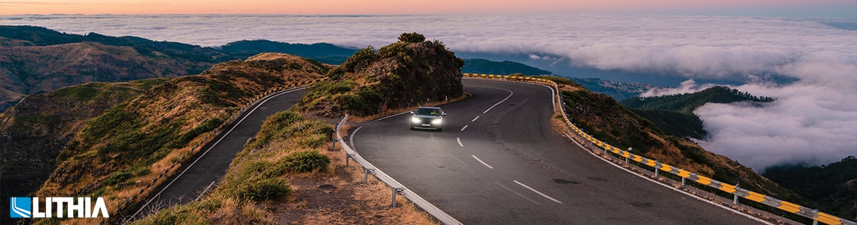 Car driving on winding mountain road
