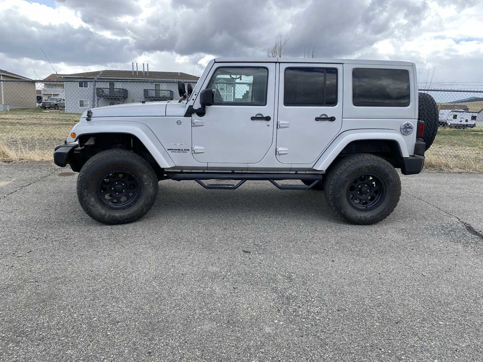 Used 2011 Jeep Wrangler Unlimited Sahara with VIN 1J4HA5H1XBL615547 for sale in Helena, MT