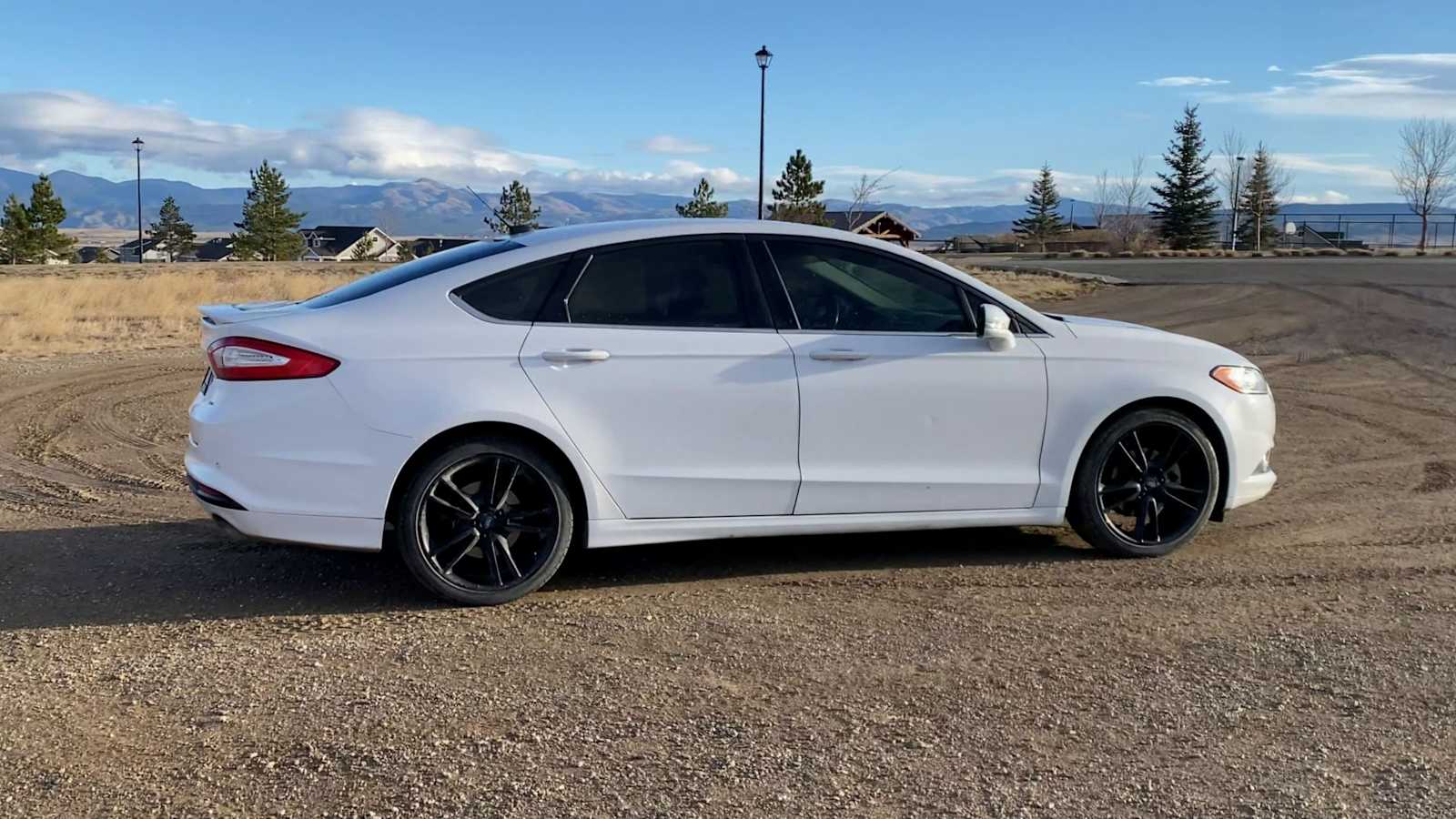 Used 2016 Ford Fusion SE with VIN 3FA6P0H74GR306173 for sale in Helena, MT