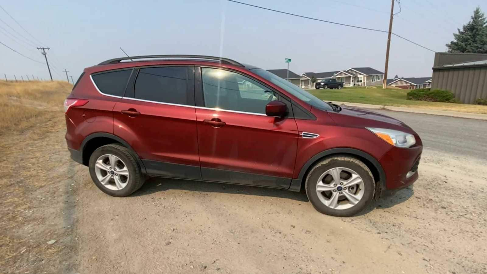 Used 2014 Ford Escape SE with VIN 1FMCU9GXXEUA08997 for sale in Helena, MT