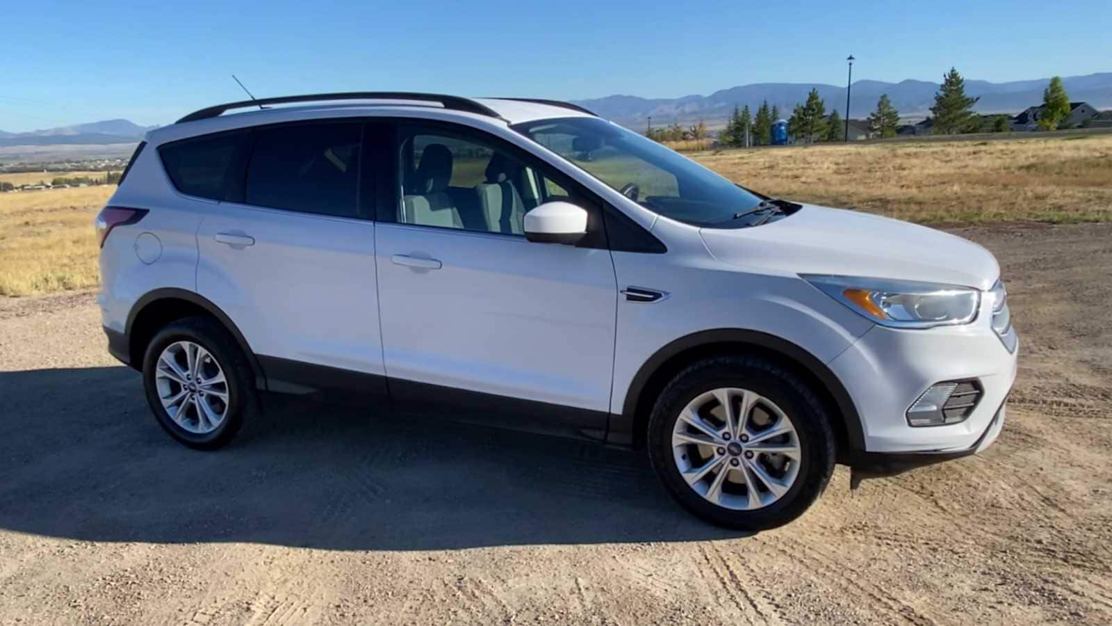 Used 2018 Ford Escape SE with VIN 1FMCU9G99JUB48812 for sale in Helena, MT