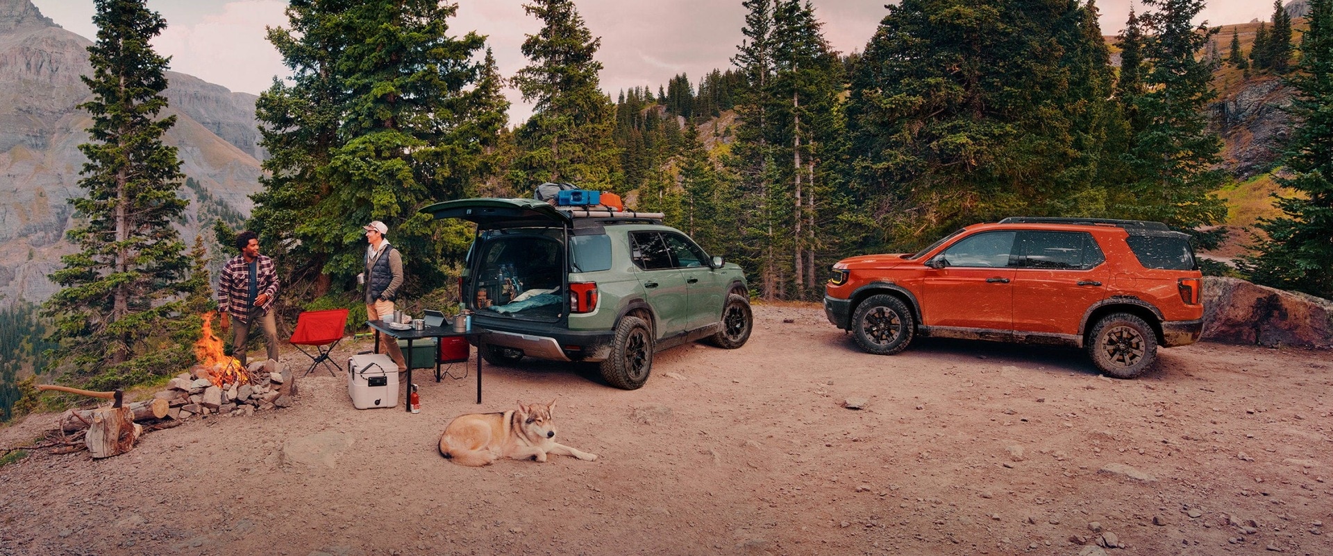 Two Honda Passports Parked on a valley