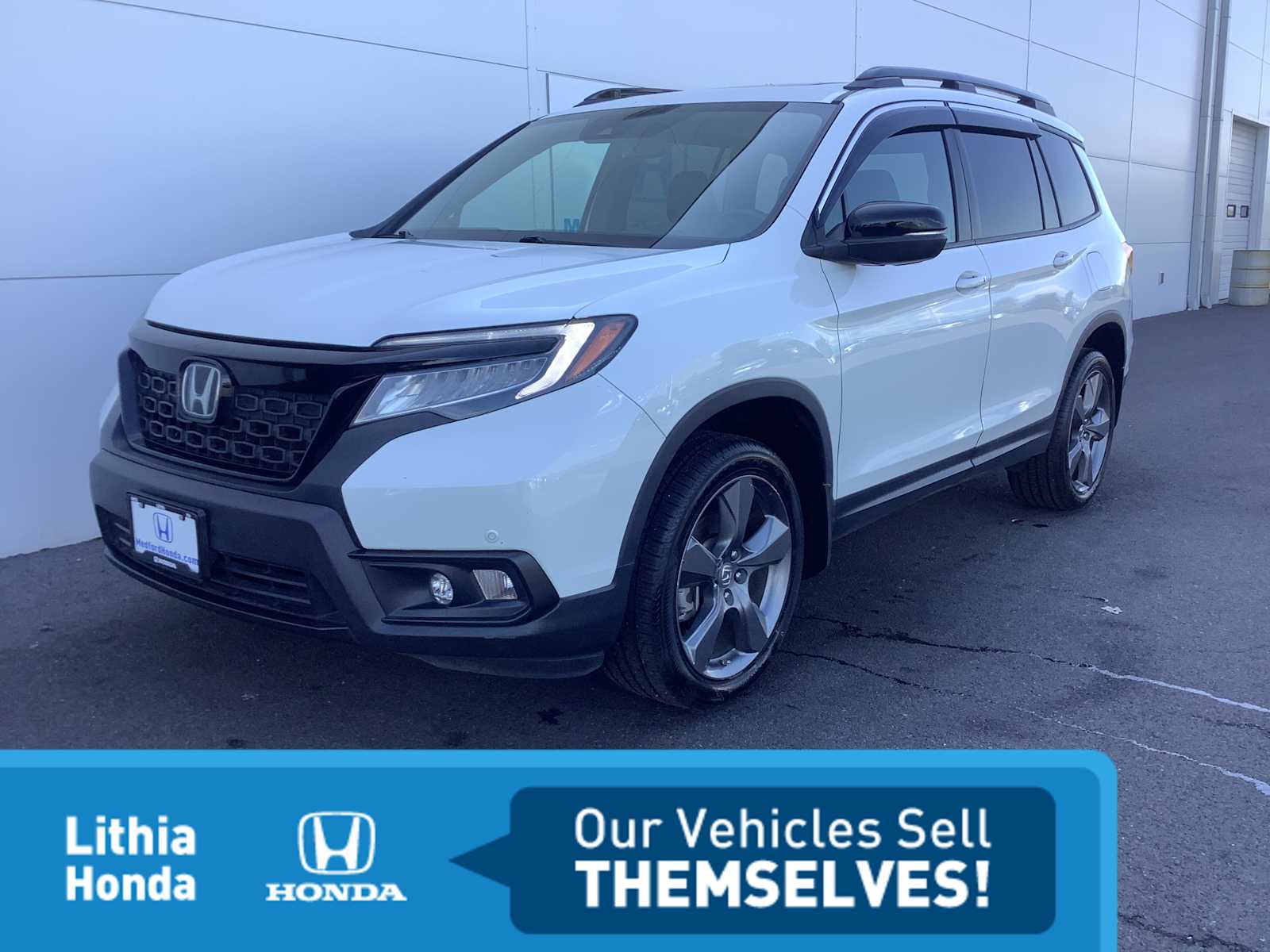 2021 Honda Passport 3.5 Touring 4WD Auto's photo